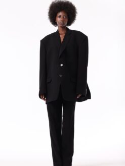 model wearing a black jacket and pants for Online shopping kuwait clothes